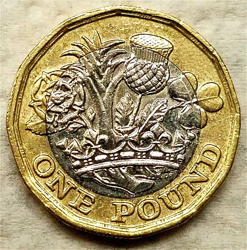 2017-Elizabeth-II-One-Pound-Design-Berms-On-Obverse-And-Reverse?